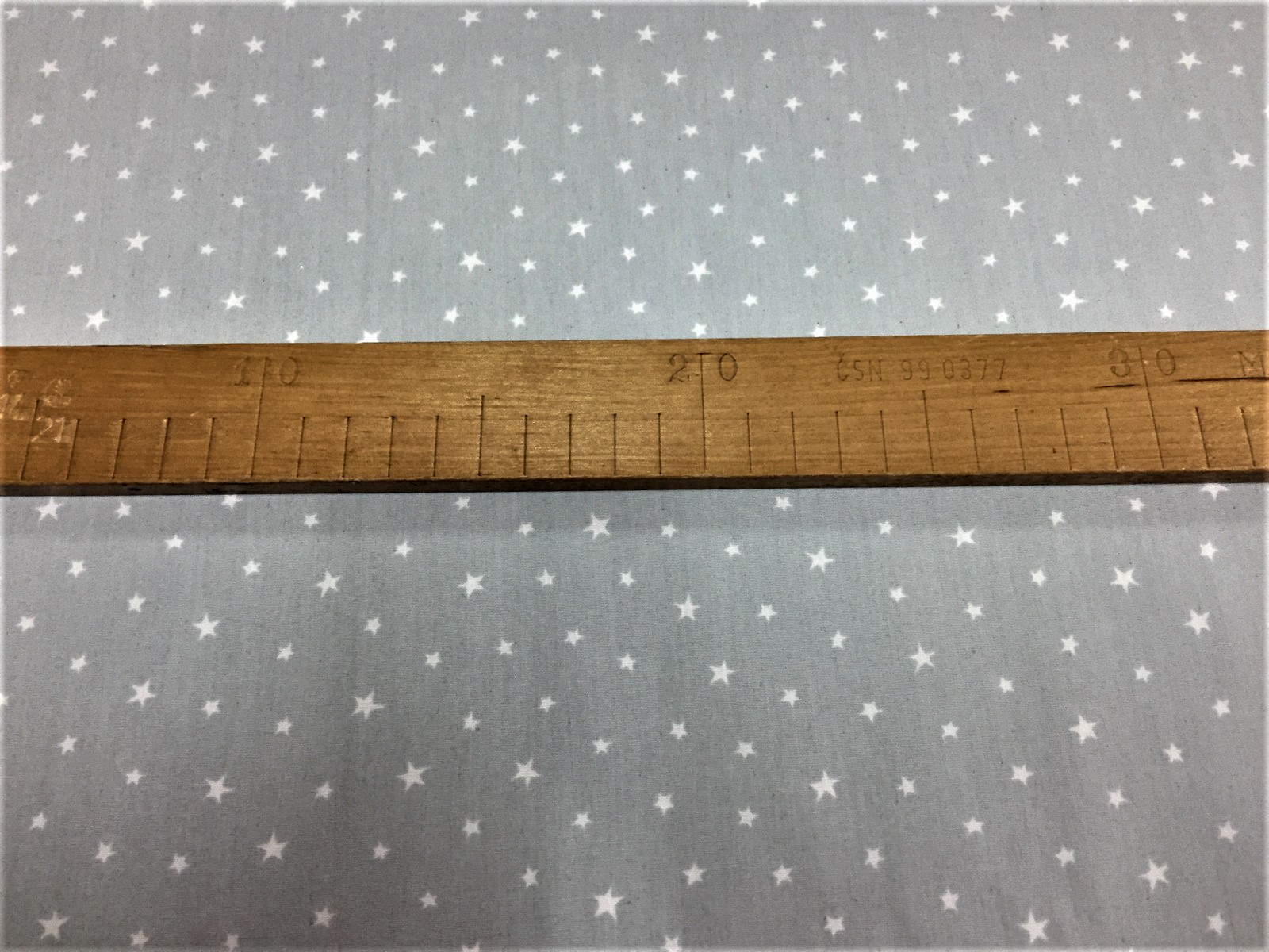 Bavlněná látka - bílé hvězdičky na šedé - šíře 140cm